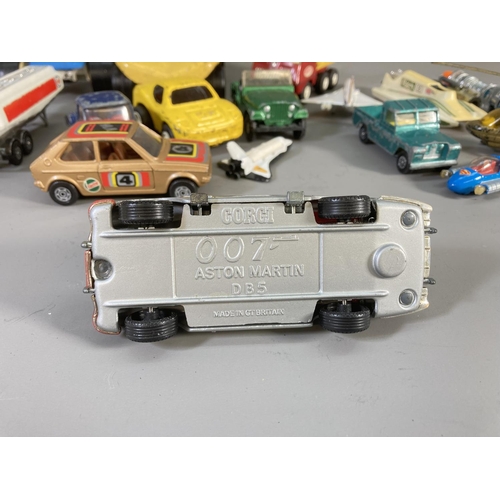 663 - A collection of Corgi and Tonka diecast model vehicles to include Corgi 007 Aston Martin DB5, Tonka ... 