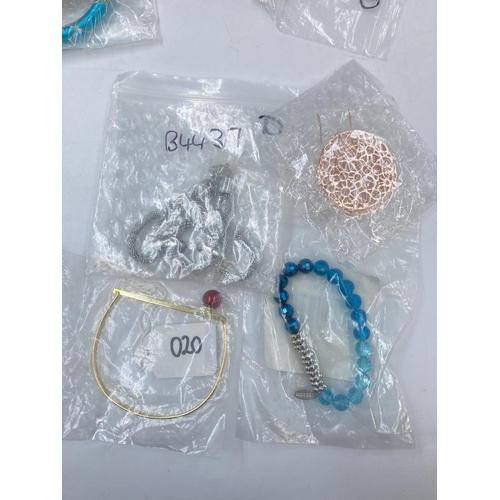 720 - A large collection of assorted costume jewellery to include bracelets, earrings, necklaces etc.