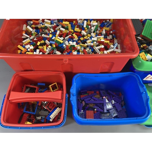 665 - Four boxes containing a large quantity of Lego