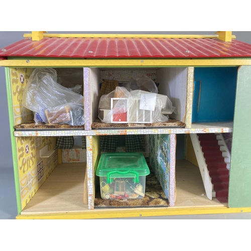 666 - A vintage handmade doll's house with furniture and accessories - approx. 50cm high x 67cm wide x 44c... 