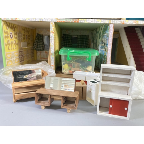 666 - A vintage handmade doll's house with furniture and accessories - approx. 50cm high x 67cm wide x 44c... 