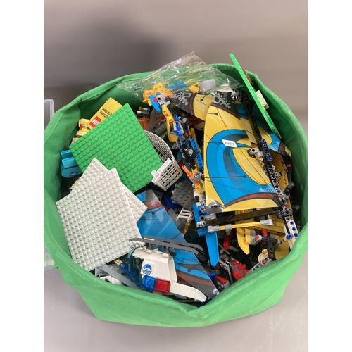 668 - Two boxes containing a large quantity of Lego