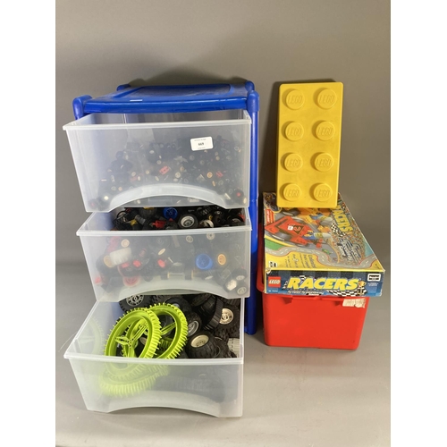 669 - A plastic three drawer storage tower and box containing a large quantity of Lego to include wheels, ... 
