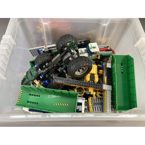 682 - Three boxes containing a large quantity of Lego