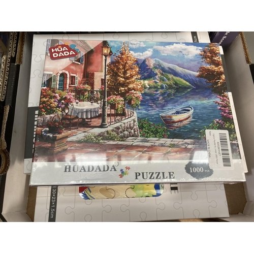 688 - Twenty seven various boxed and sealed jigsaw puzzles to include Huadada lakeside scenery, Puppy Drea... 