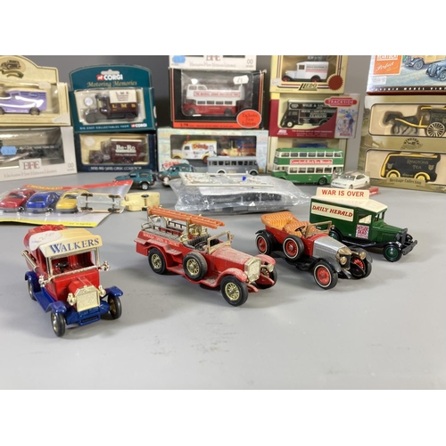 608 - A collection of boxed and unboxed diecast model vehicles to include Corgi Motoring Memories 61218 LM... 