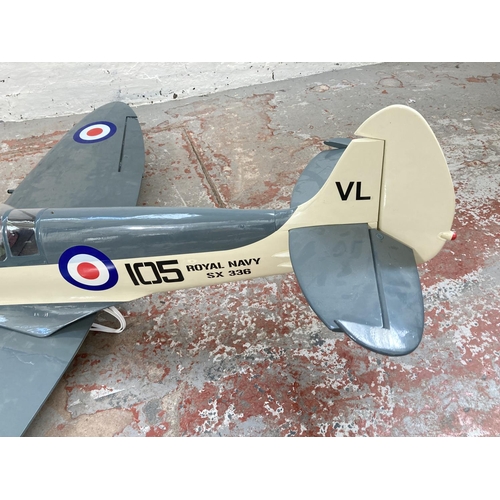 617 - A remote control Royal Navy Seafire SX336 aircraft model - approx. 128cm long x 163cm wide