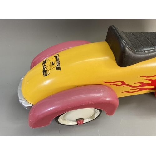 618 - A Baghera Flame Speedster metal ride on car - approx. 36cm high x 25cm wide x 75cm long