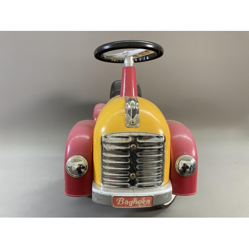 618 - A Baghera Flame Speedster metal ride on car - approx. 36cm high x 25cm wide x 75cm long