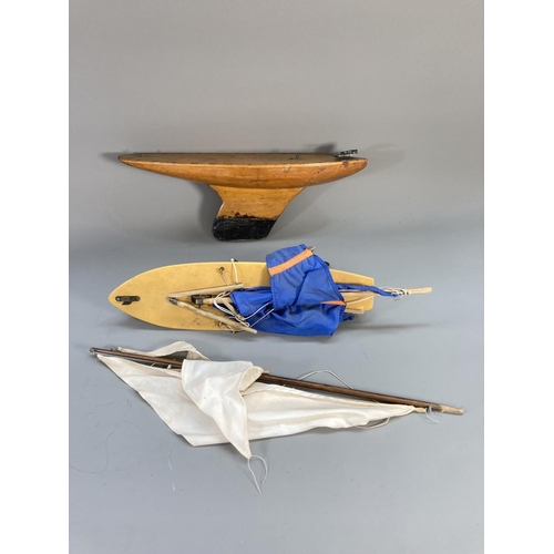 629 - Two vintage handmade model yachts - largest approx. 46cm long