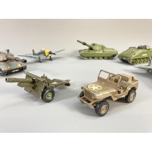 634 - Nine military model vehicles, one The Crescent Toy Co Ltd. and eight Dinky to include Leopard tank, ... 