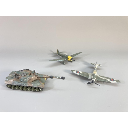 634 - Nine military model vehicles, one The Crescent Toy Co Ltd. and eight Dinky to include Leopard tank, ... 