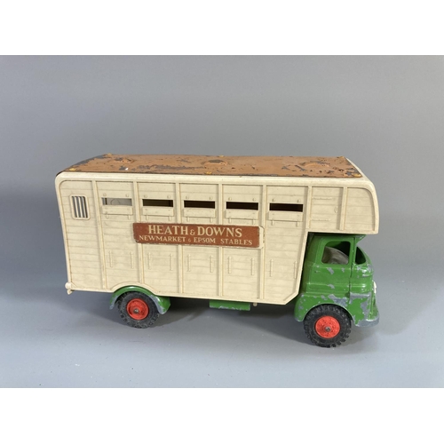 635 - Two vintage Tri-ang tinplate model vehicles, one Heath & Downs Horse Box Truck and one farm truck