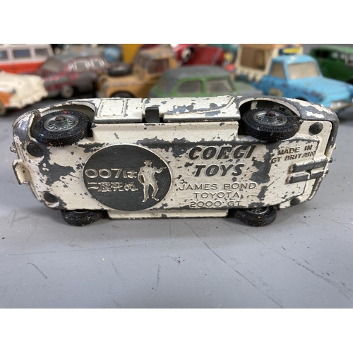 640 - A collection of assorted diecast model vehicles to include Corgi E-Type Jaguar, Dinky Ford Cortina, ... 