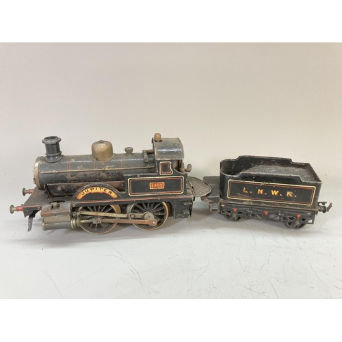 641 - An early 20th century Bing live steam O gauge 0-4-0 Jupiter 1902 locomotive and tender in black L.N.... 