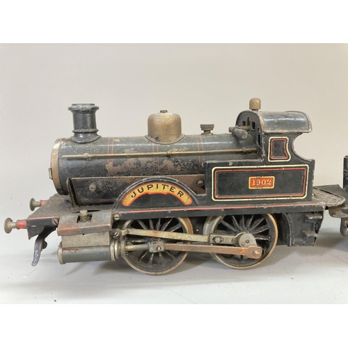 641 - An early 20th century Bing live steam O gauge 0-4-0 Jupiter 1902 locomotive and tender in black L.N.... 