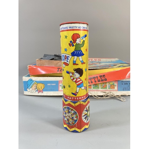 647 - A collection of vintage games to include Dominoes, Acme Toys kaleidoscope, 1960s Chad Valley battery... 