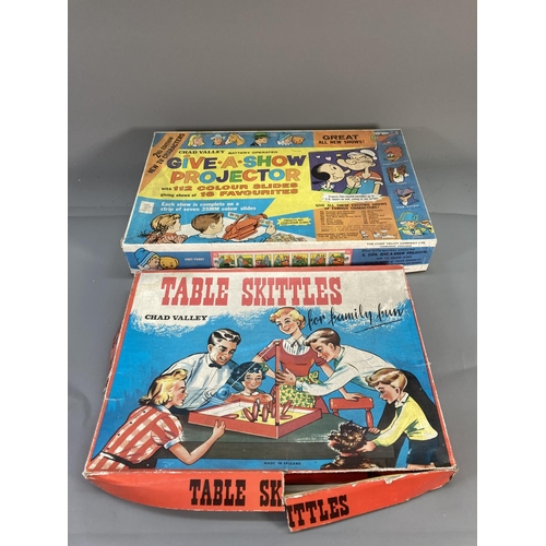 647 - A collection of vintage games to include Dominoes, Acme Toys kaleidoscope, 1960s Chad Valley battery... 