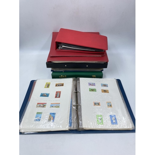 762 - Six stamp albums containing various stamps to include Royal Airforce, Famous Trains, Landmarks, Firs... 