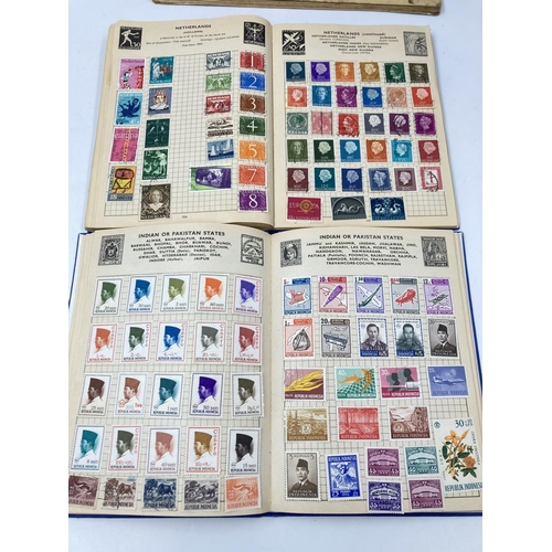 764 - A large collection of various stamps and stamp albums containing various World Wide stamps