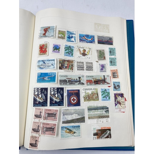 764 - A large collection of various stamps and stamp albums containing various World Wide stamps