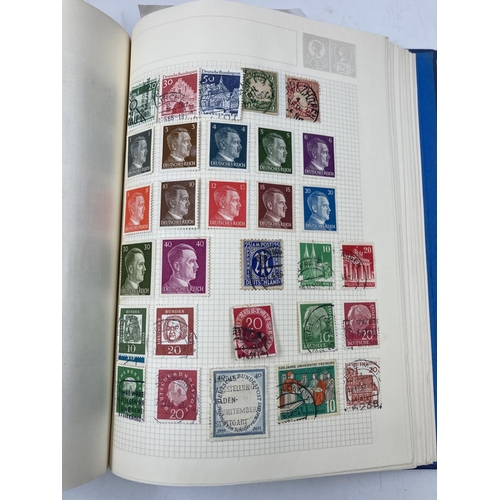 765 - Five stamp albums containing a large collection of assorted World Wide stamps