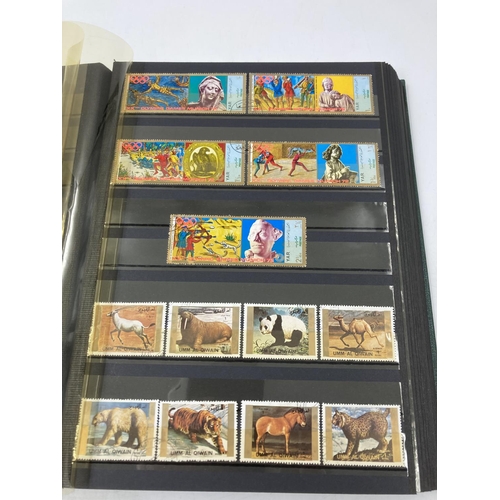 765 - Five stamp albums containing a large collection of assorted World Wide stamps