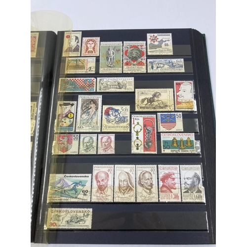 765 - Five stamp albums containing a large collection of assorted World Wide stamps