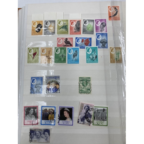 767 - Seven stamp albums containing a large collection of assorted World Wide stamps and First Day covers ... 