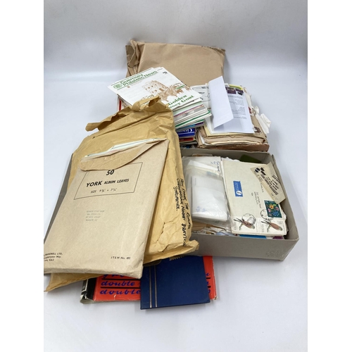 757 - A large collection of assorted First Day covers and stamp albums