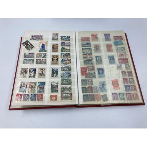 758 - Four various stamp albums to include The Rodney Cover Album containing various First Day covers etc.