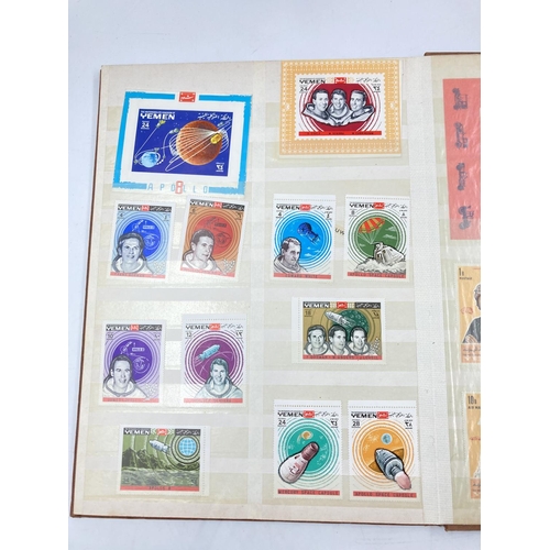 759 - A large collection of various stamp albums containing assorted stamps to include World Wide, nature,... 