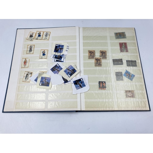 759 - A large collection of various stamp albums containing assorted stamps to include World Wide, nature,... 