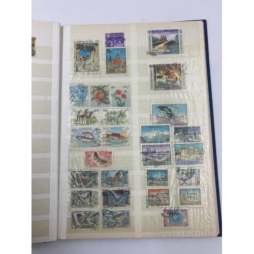 759 - A large collection of various stamp albums containing assorted stamps to include World Wide, nature,... 