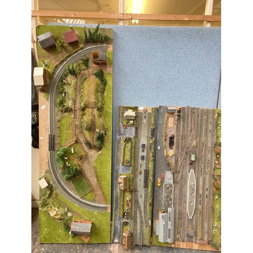 612 - Five pieces of scratch built OO gauge model railway track with buildings and accessories