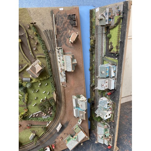 612 - Five pieces of scratch built OO gauge model railway track with buildings and accessories