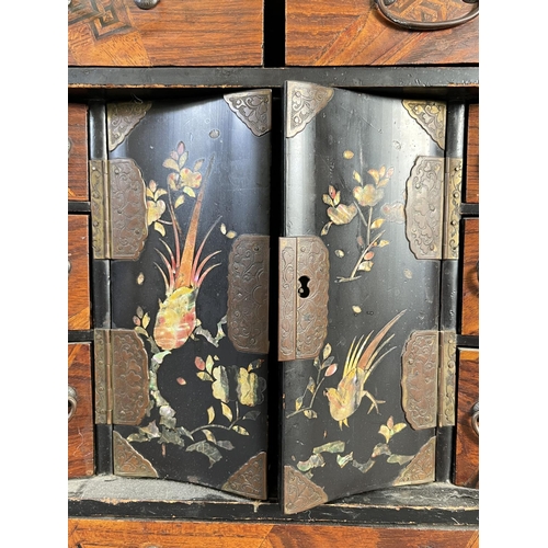 818 - An early/mid 20th century Japanese marquetry and lacquered table top jewellery cabinet with mother o... 