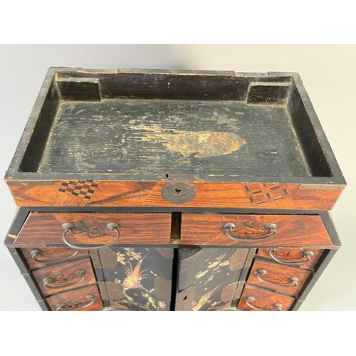 818 - An early/mid 20th century Japanese marquetry and lacquered table top jewellery cabinet with mother o... 