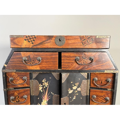 818 - An early/mid 20th century Japanese marquetry and lacquered table top jewellery cabinet with mother o... 