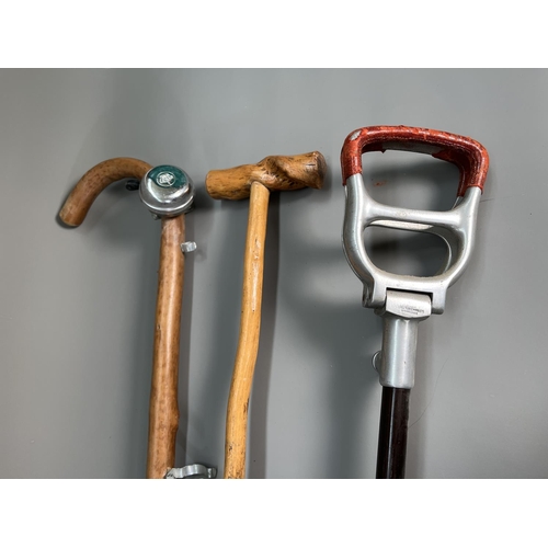 822 - A collection of seven vintage shooting and walking sticks