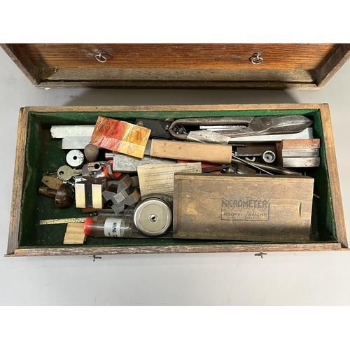 825 - A 1940s Fearcleve Products of Cheltenham oak cased seven drawer engineer's tool chest containing a l... 