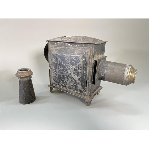 831 - A Victorian child's magic lantern with a large collection of assorted slides