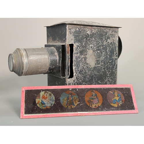 831 - A Victorian child's magic lantern with a large collection of assorted slides