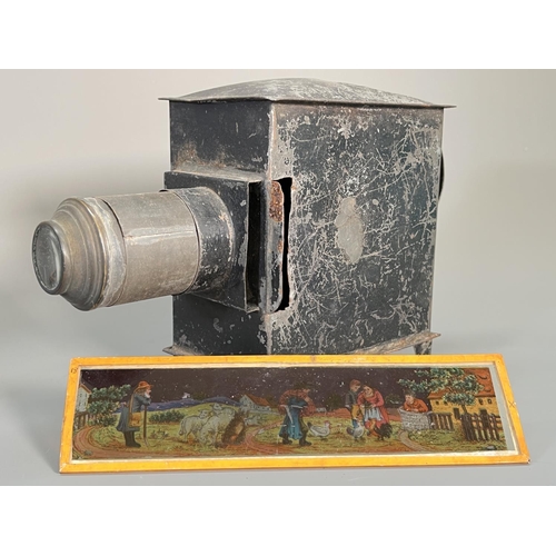 831 - A Victorian child's magic lantern with a large collection of assorted slides