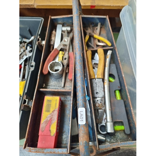 1673 - A large collection of assorted tools to include set of mini car jacks, set of ladder clamps, vintage... 