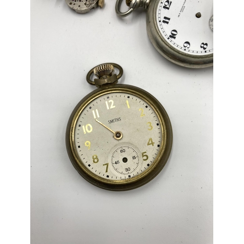 725 - A collection of vintage watch makers accessories to include movements, parts, cases etc.