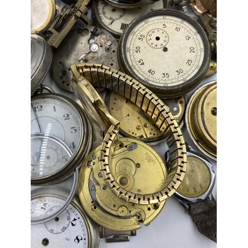 725 - A collection of vintage watch makers accessories to include movements, parts, cases etc.