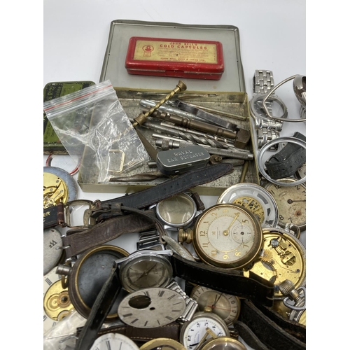 725 - A collection of vintage watch makers accessories to include movements, parts, cases etc.