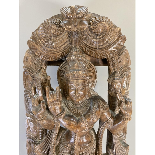 842 - An Indian carved hardwood Lakshmi panel - approx. 91cm high x 34cm wide