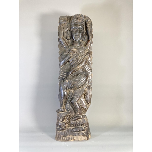 843 - An Indian carved hardwood Lakshmi panel - approx. 80cm high x 24cm wide